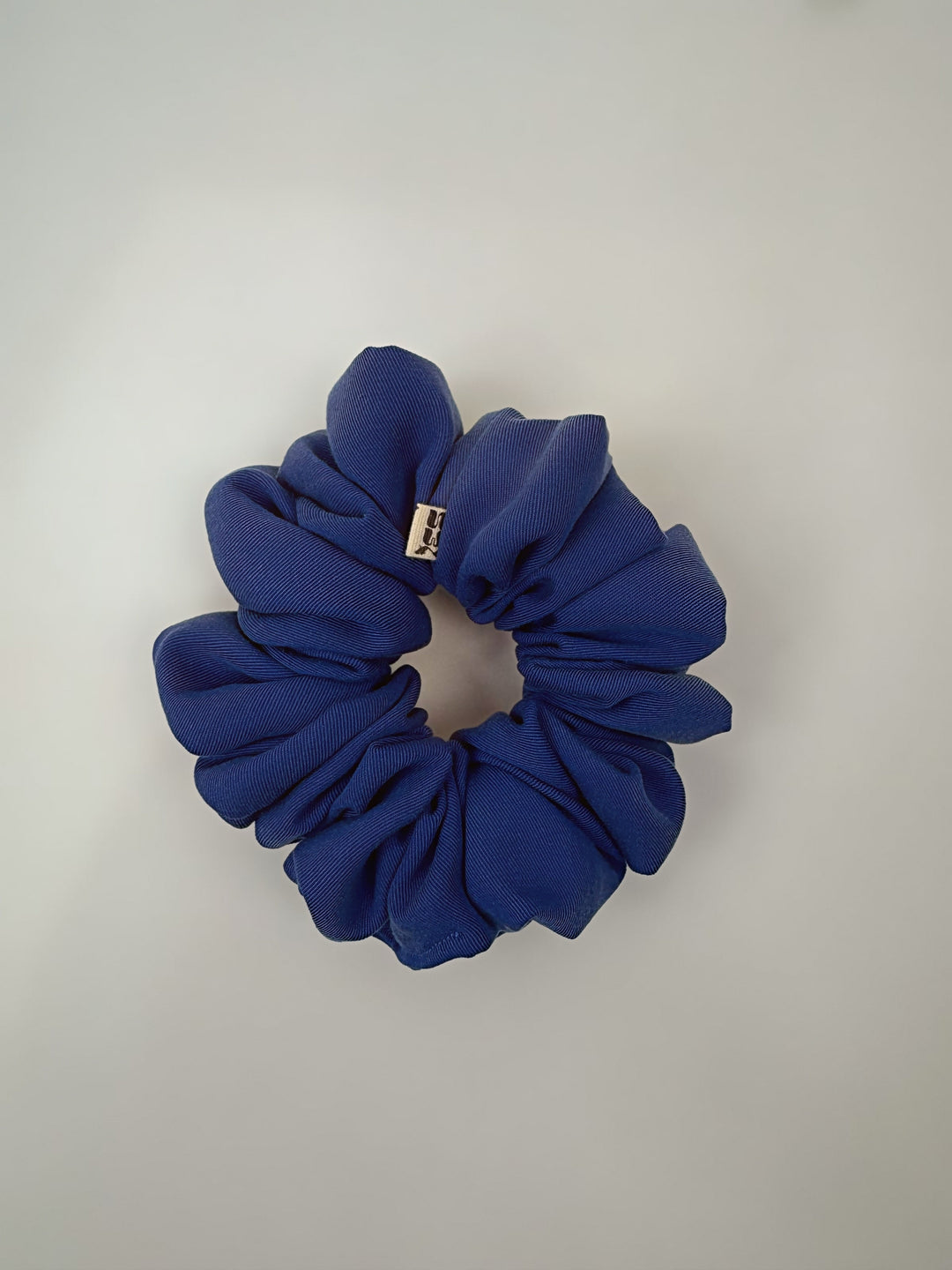 ELASTICO PER CAPELLI IN TESSUTO BLU