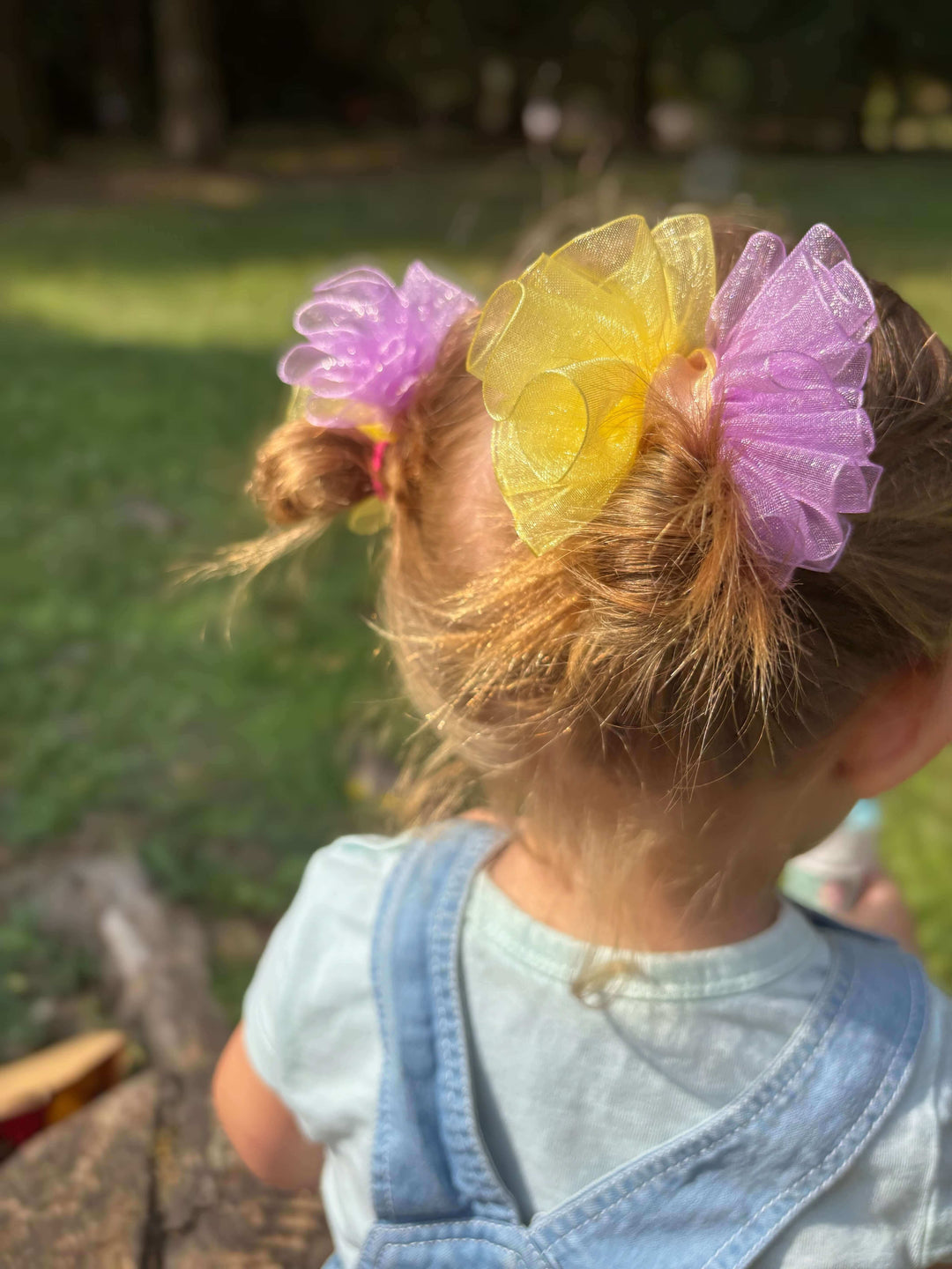 Fiocchetti per capelli bon bon giallo e viola per piccole principesse
